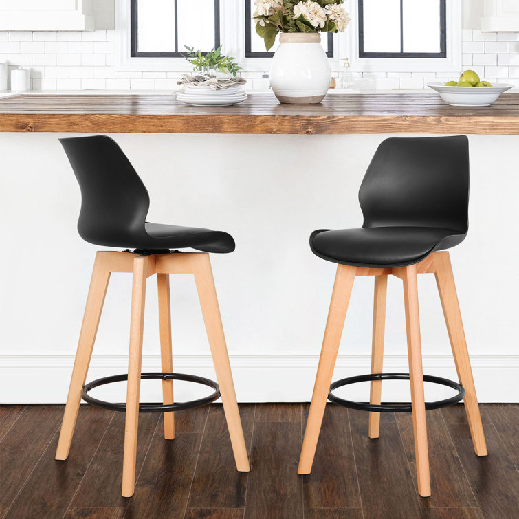 Corrigan Studio® 360° Swivel Upholstered Solid Wood Counter Stool